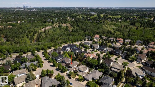 Aerial perspective of a residential neighborhood featuring established homes with varying roof styles - 315 Osland Place, Edmonton, AB 