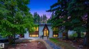 Modern exterior featuring a prominent A-frame entry, wood-finish siding accents, and large windows - 43 Burnham Place, St. Albert, AB 
