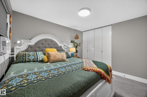 Bedroom featuring light gray wall paint and gray carpet flooring - 43 Burnham Place, St. Albert, AB 