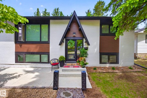 Modern exterior featuring white brick siding and black trim accents - 43 Burnham Place, St. Albert, AB 