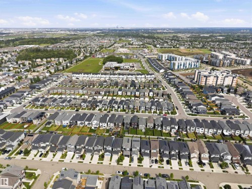 Residential development featuring a mix of detached homes and multi-story buildings - 9323 223 Street, Edmonton, AB 