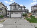 Two-story residence featuring gray siding and white trim - 13 Baie Madelene, Beaumont, AB 