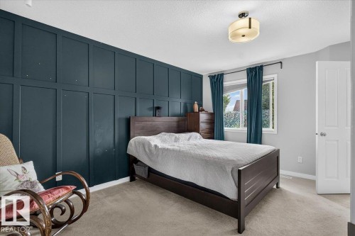 Accent wall featuring board and batten paneling - 13 Baie Madelene, Beaumont, AB 