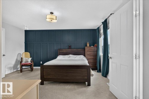 Accent wall featuring panel molding - 13 Baie Madelene, Beaumont, AB 