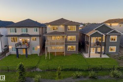 Newly constructed homes featuring multi-level rear exteriors - 