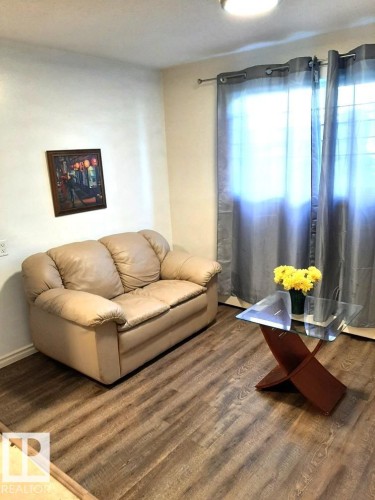 Wood-finish flooring throughout - 104 12409 82 Street, Edmonton, AB 