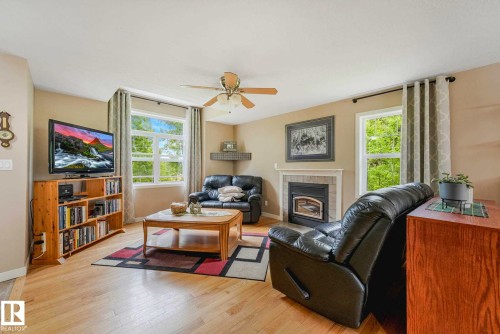 #31 56110 Rge Road 13, Rural Lac Ste. Anne County, AB - Indoor Photo Showing Living Room With Fireplace
