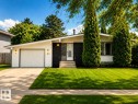 Contemporary single-story residence featuring a white and black brick facade - 24 Addison Crescent, St. Albert, AB 