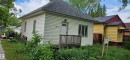 Single-story residence featuring light-colored siding and a dark shingle roof - 12741 117 Street Nw, Edmonton, AB 