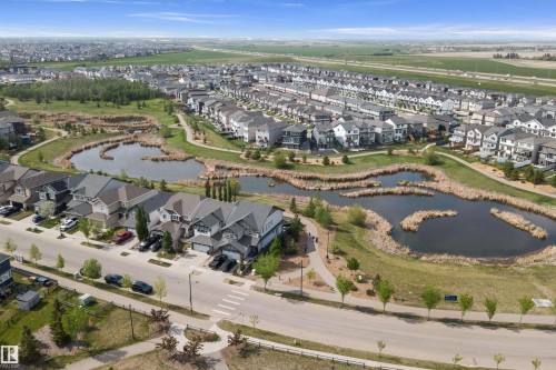 Aerial perspective showcasing a residential community with varied architectural styles - 363 Cy Becker Boulevard, Edmonton, AB - Outdoor With View