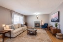 1044 Barnes Way, Edmonton, AB  - Indoor Photo Showing Living Room With Fireplace 