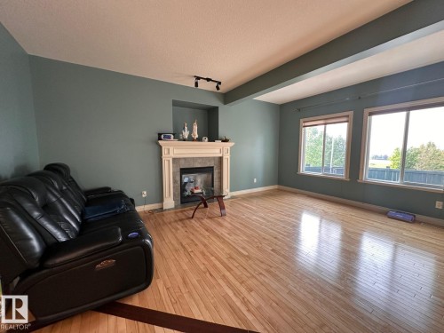 30 Virginia Avenue, Spruce Grove, AB - Indoor Photo Showing Living Room With Fireplace