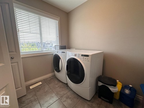 30 Virginia Avenue, Spruce Grove, AB - Indoor Photo Showing Laundry Room