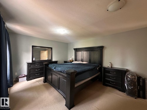 30 Virginia Avenue, Spruce Grove, AB - Indoor Photo Showing Bedroom