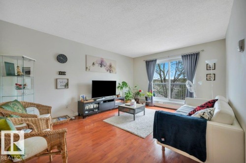 304 5065 31 Avenue, Edmonton, AB - Indoor Photo Showing Living Room