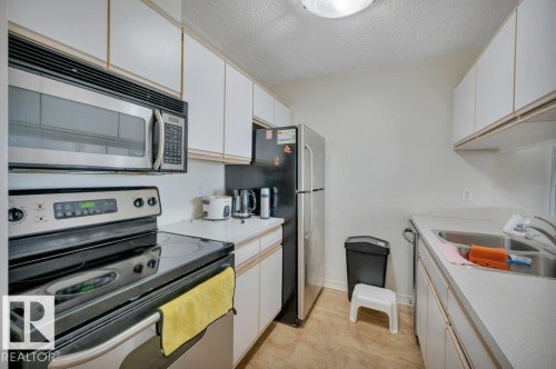 304 5065 31 Avenue, Edmonton, AB - Indoor Photo Showing Kitchen With Stainless Steel Kitchen With Double Sink