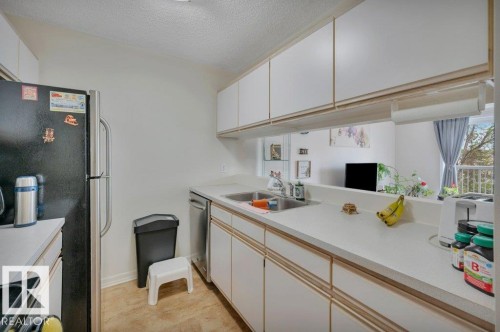 304 5065 31 Avenue, Edmonton, AB - Indoor Photo Showing Kitchen With Double Sink