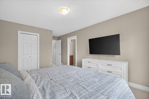 Bedroom with neutral wall tones and carpeted flooring - 12032 167B Avenue, Edmonton, AB 