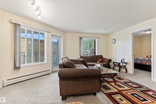 117 111 Edwards Drive, Edmonton, AB - Indoor Photo Showing Living Room