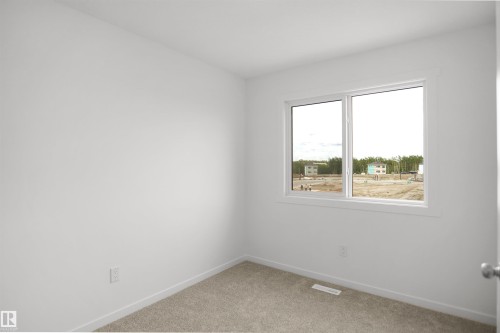 525 Aster Drive Nw, Edmonton, AB - Indoor Photo Showing Other Room