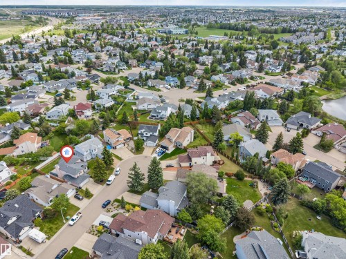 Aerial perspective showcasing a residential area with diverse home styles - 4465 32A Street, Edmonton, AB 