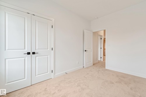 Neutral tone carpeting throughout - 4636 18 Avenue, Edmonton, AB 