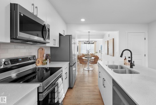 #18 3705 141 St Sw, Edmonton, AB - Indoor Photo Showing Kitchen With Double Sink With Upgraded Kitchen
