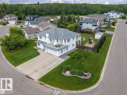 Corner lot residence featuring a two-story design with multiple balconies - 2602 Delta Road, Cold Lake, AB 