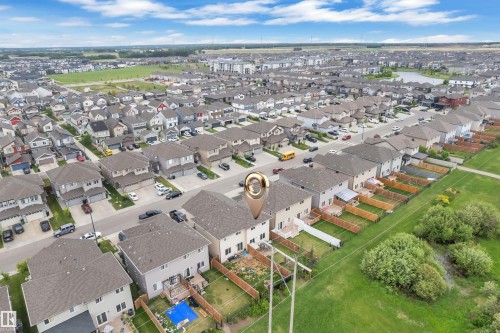 Aerial view of a residential community featuring single-family homes with fenced backyards - 1750 27 Street, Edmonton, AB 