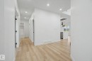 Entryway featuring wood-finish flooring and recessed lighting - 4 Willow Heights Drive, Stony Plain, AB 