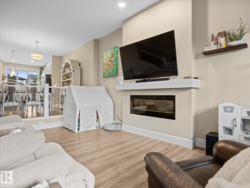 4036 Chappelle Green Sw, Edmonton, AB - Indoor Photo Showing Living Room With Fireplace