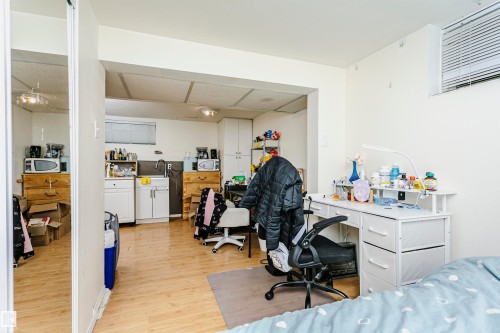 Workstation featuring a white desk with multiple drawers - 11105 81 Avenue, Edmonton, AB 