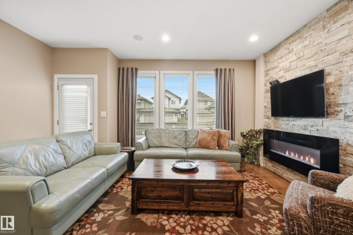 3252 Allan Way, Edmonton, AB - Indoor Photo Showing Living Room With Fireplace