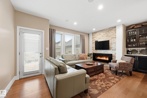 3252 Allan Way, Edmonton, AB - Indoor Photo Showing Living Room With Fireplace