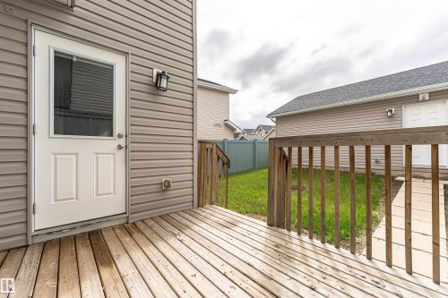 Exterior deck crafted from wood planks, featuring wood railings - 2397 Glenridding Boulevard, Edmonton, AB 