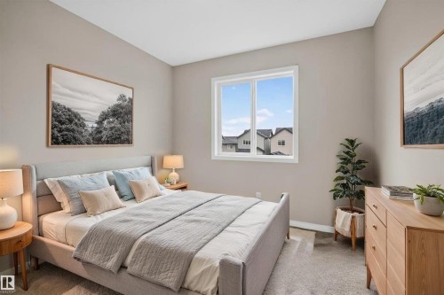 Bedroom with neutral wall tones and carpeted flooring - 2144 51 Street, Edmonton, AB 