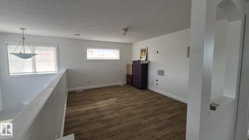 5440 1A Avenue, Edmonton, AB - Indoor Photo Showing Other Room