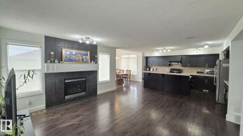 5440 1A Avenue, Edmonton, AB - Indoor Photo Showing Living Room With Fireplace