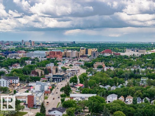 Expansive urban landscape featuring a mix of residential structures and commercial buildings - 11241 88 Street, Edmonton, AB 