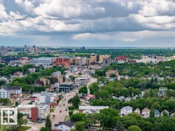 Expansive urban landscape featuring a mix of residential structures and commercial buildings - 