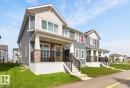 Modern townhome exterior featuring grey siding and light-colored gables - 1022 Hearthstone Boulevard, Sherwood Park, AB 