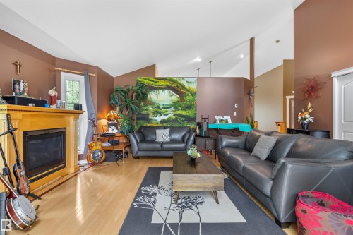 #302 49006 Range Road 73, Rural Brazeau County, AB - Indoor Photo Showing Living Room With Fireplace