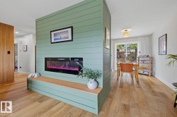 Feature wall with shiplap-style paneling and an integrated fireplace - 