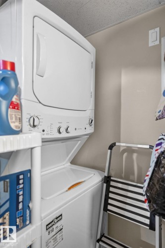Vertical stacked laundry appliances with white finish - 122 279 Suder Greens Drive, Edmonton, AB 
