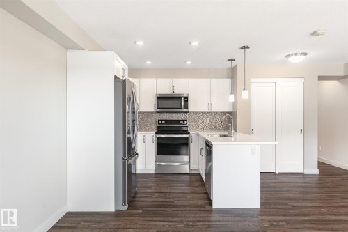 #210 1029 173 St Sw, Edmonton, AB - Indoor Photo Showing Kitchen With Double Sink With Upgraded Kitchen
