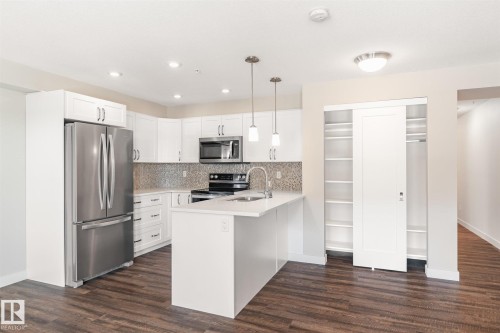 #210 1029 173 St Sw, Edmonton, AB - Indoor Photo Showing Kitchen With Upgraded Kitchen