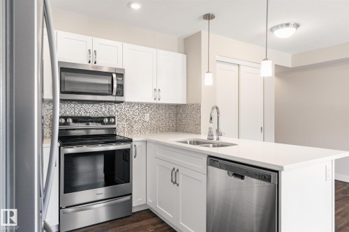 #210 1029 173 St Sw, Edmonton, AB - Indoor Photo Showing Kitchen With Double Sink With Upgraded Kitchen