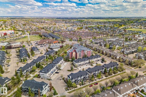 Expansive aerial capturing a densely developed residential area with varied housing types - 209 5280 Terwillegar Boulevard, Edmonton, AB - Outdoor With View