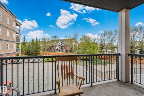 Private balcony with a concrete floor and black wrought iron railing - 209 5280 Terwillegar Boulevard, Edmonton, AB - Outdoor With Balcony With Exterior
