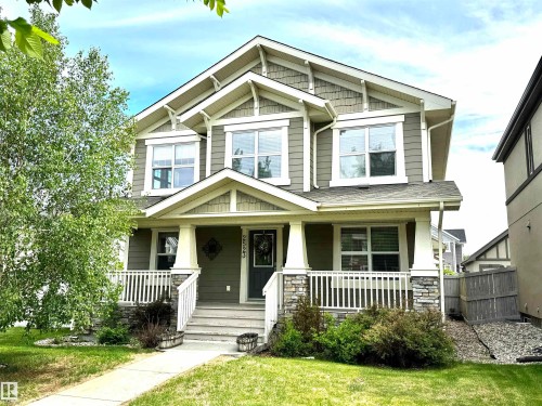 Craftsman-style exterior with gabled roof lines and decorative brackets - 2523 Pegasus Boulevard, Edmonton, AB 